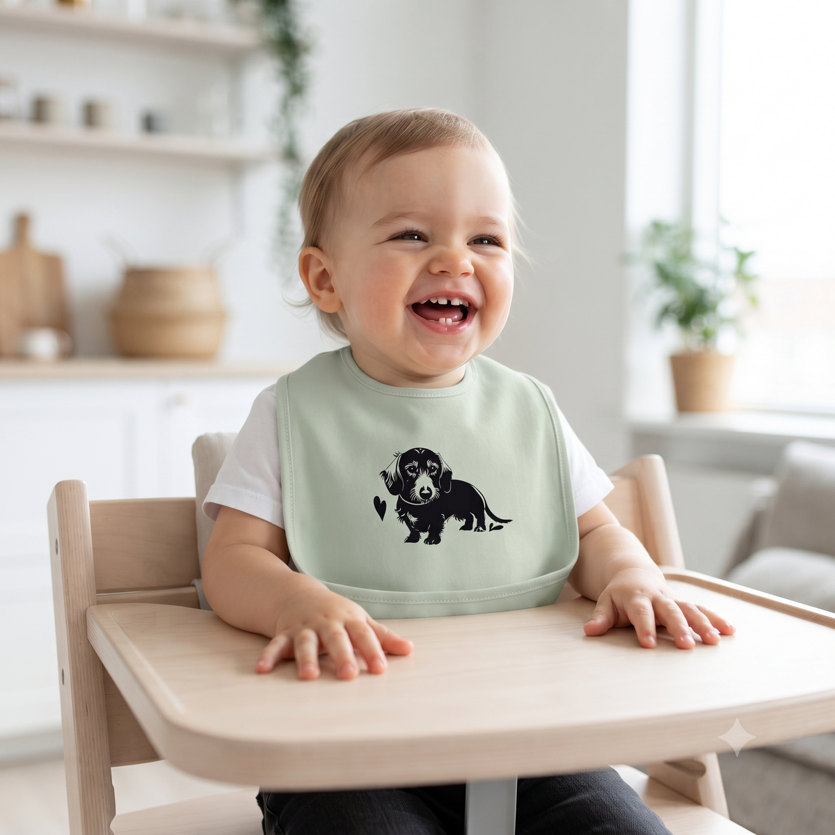 Kinder Bio Lätzchen mit Dackel Print als Geschenkidee